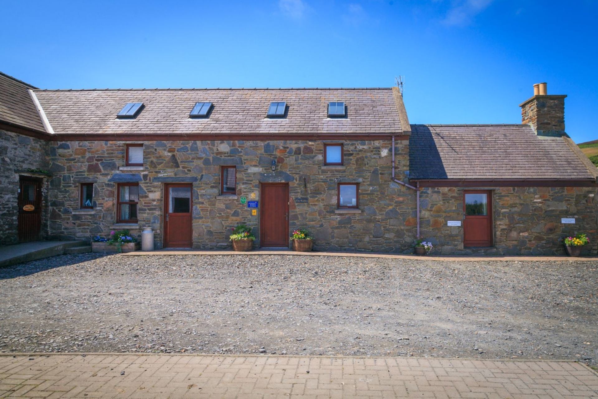 The Stables is a Situated on a working farm in the west of the island, The Stables is a luxury three-bedroomed cottag