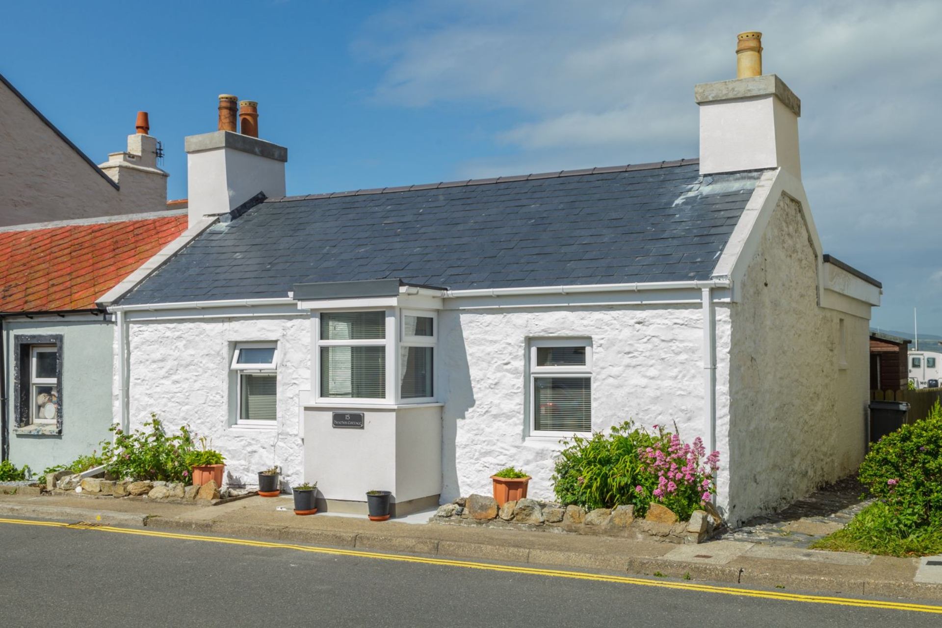 Heather Cottage is a Heather Cottage is a beautifully light and airy seaside cottage a stone's throw from the harbour