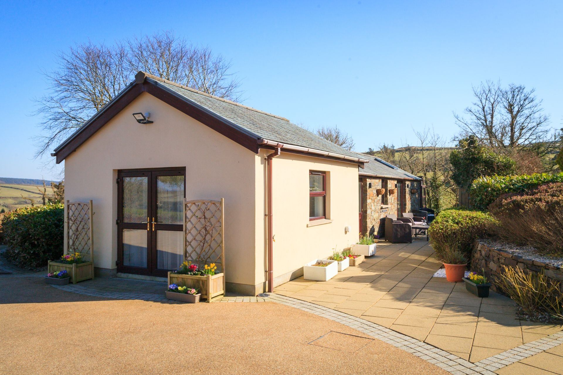 Kerrowdhoo Farmhouse is a A peaceful countryside retreat in Foxdale, Isle of Man.